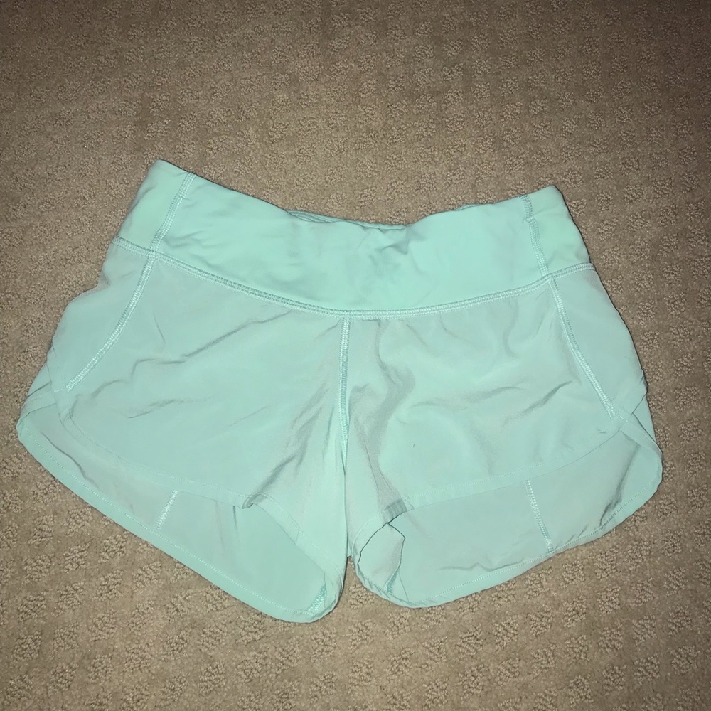 Mint/ Teal green Lululemon shorts